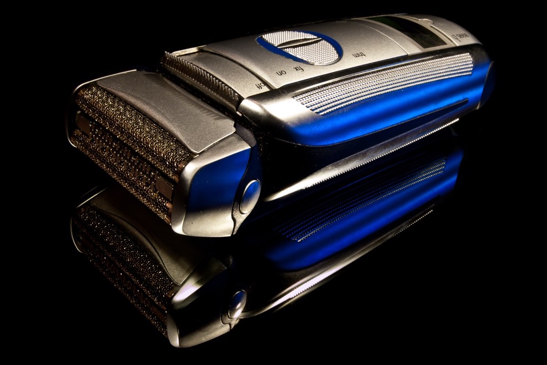 Electric foil shaver on a bathroom countertop