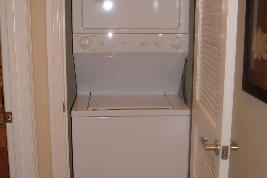 LG WashTower stacked laundry center in a modern laundry room