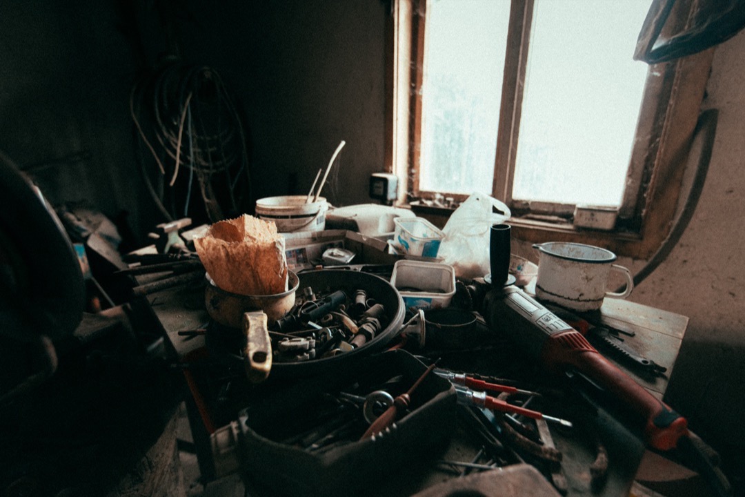 Workshop workbench with hand tools and pegboard storage